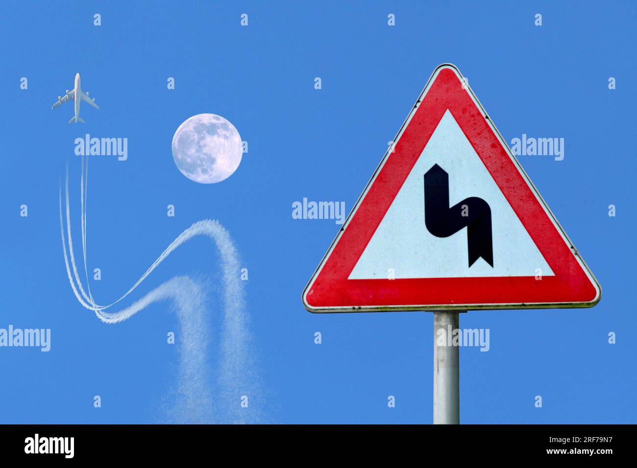 Flugzeug weicht einem Verkehrsschild entsprechend dem Mond aus, Deutschland | airplane obeying traffic sign, avoiding crash with a moon, Stock Photo