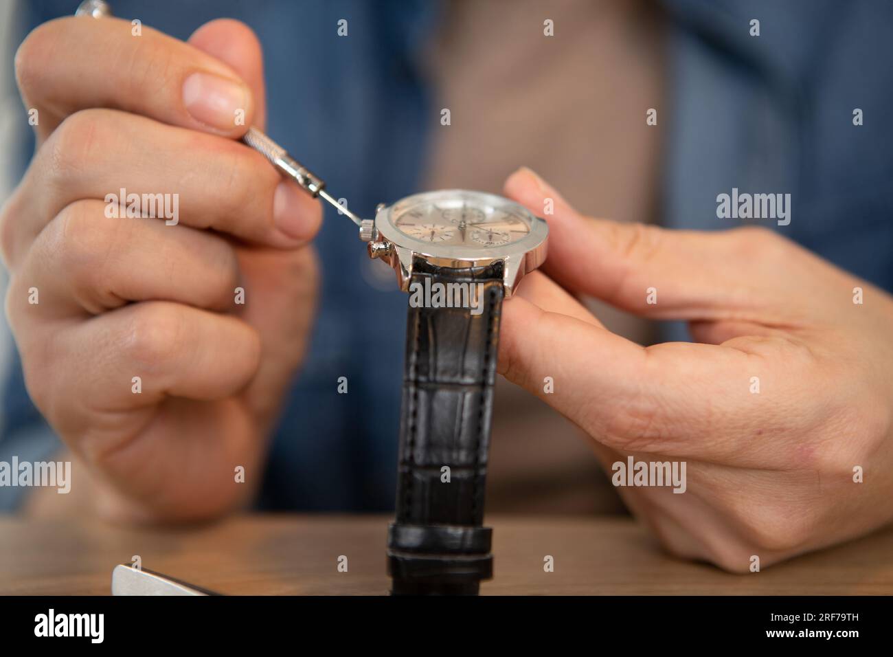 close up portrait of a watchmaker at work Stock Photo