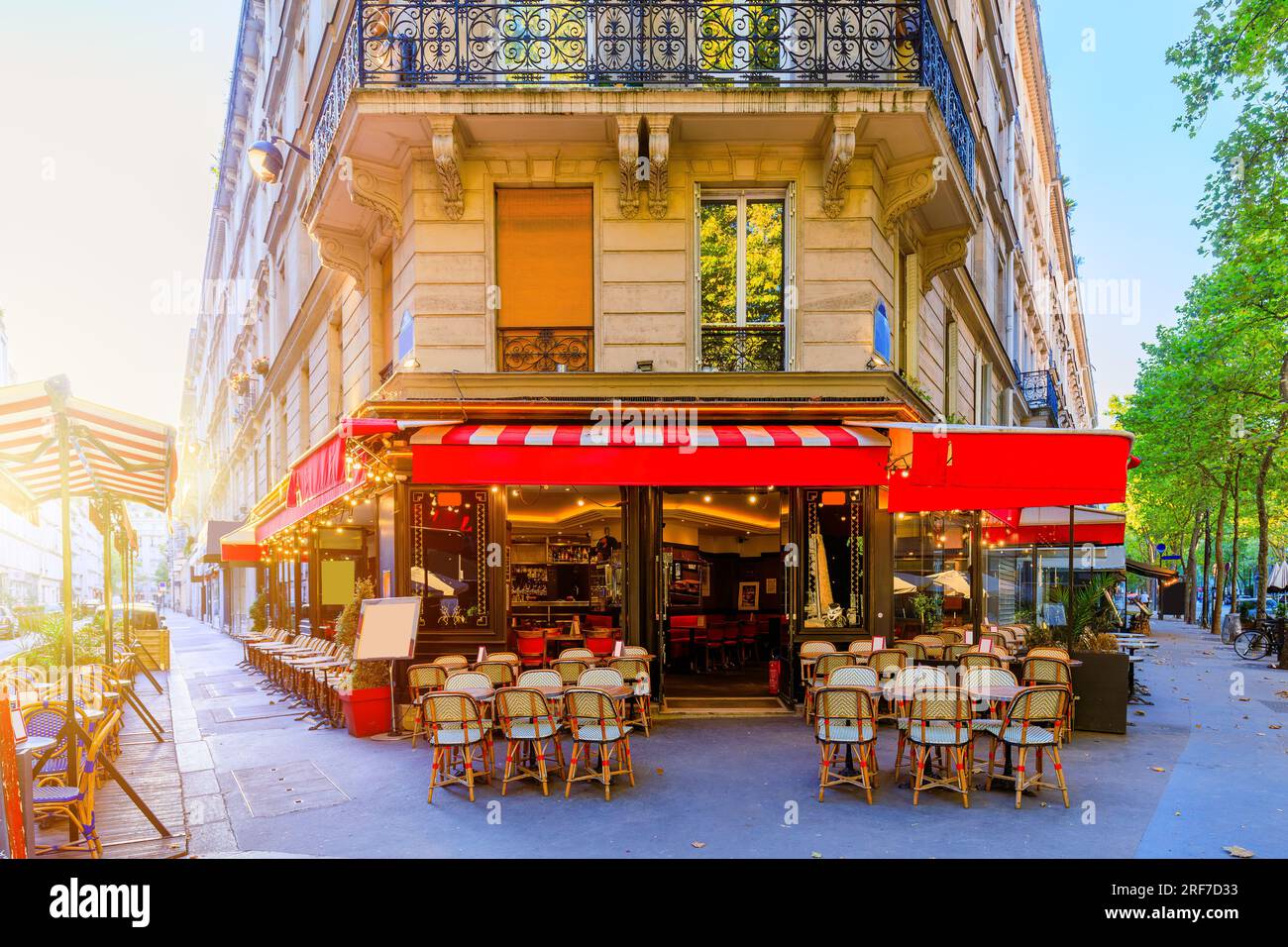 Paris, France. Parisian street with tables of a brasserie (restaurant). Stock Photo