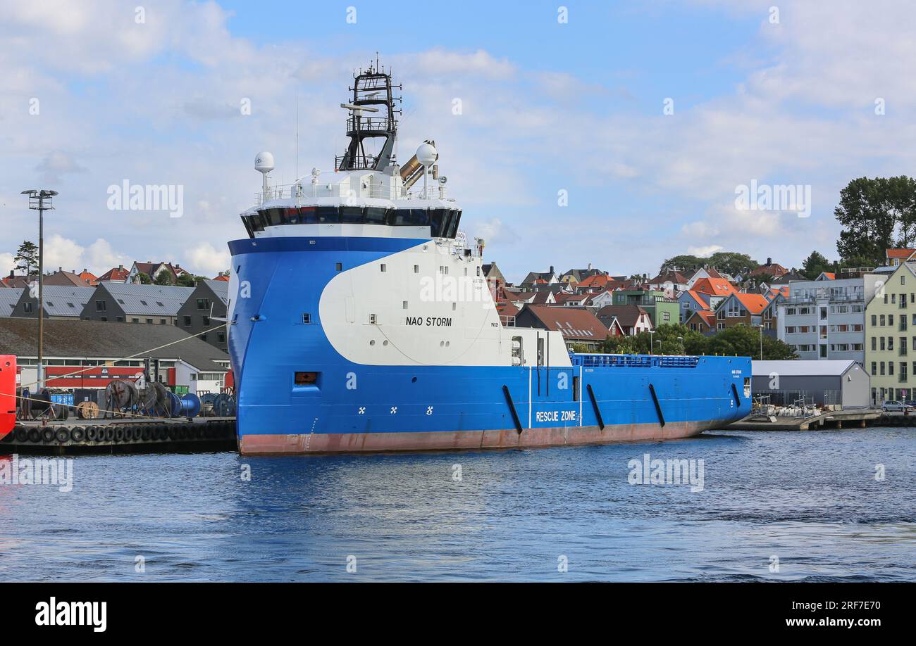 Offshore platform supply vessel Nao Storm (also known as Blue, Aurora, Hermit Storm), Ulstein inverted X-bow hull design tug in Stavanger, Norway Stock Photo