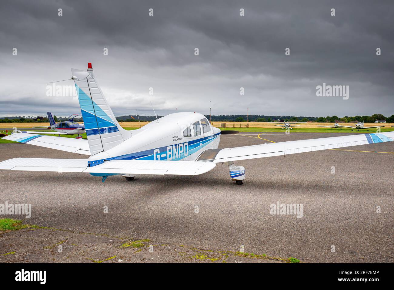 Light aircraft parked at a small airport. Stock Photo