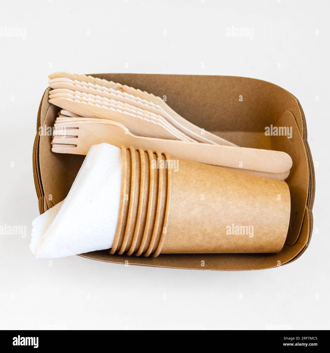 Disposable environmentally ecofriendly food packaging. Brown craft paper containers, drink