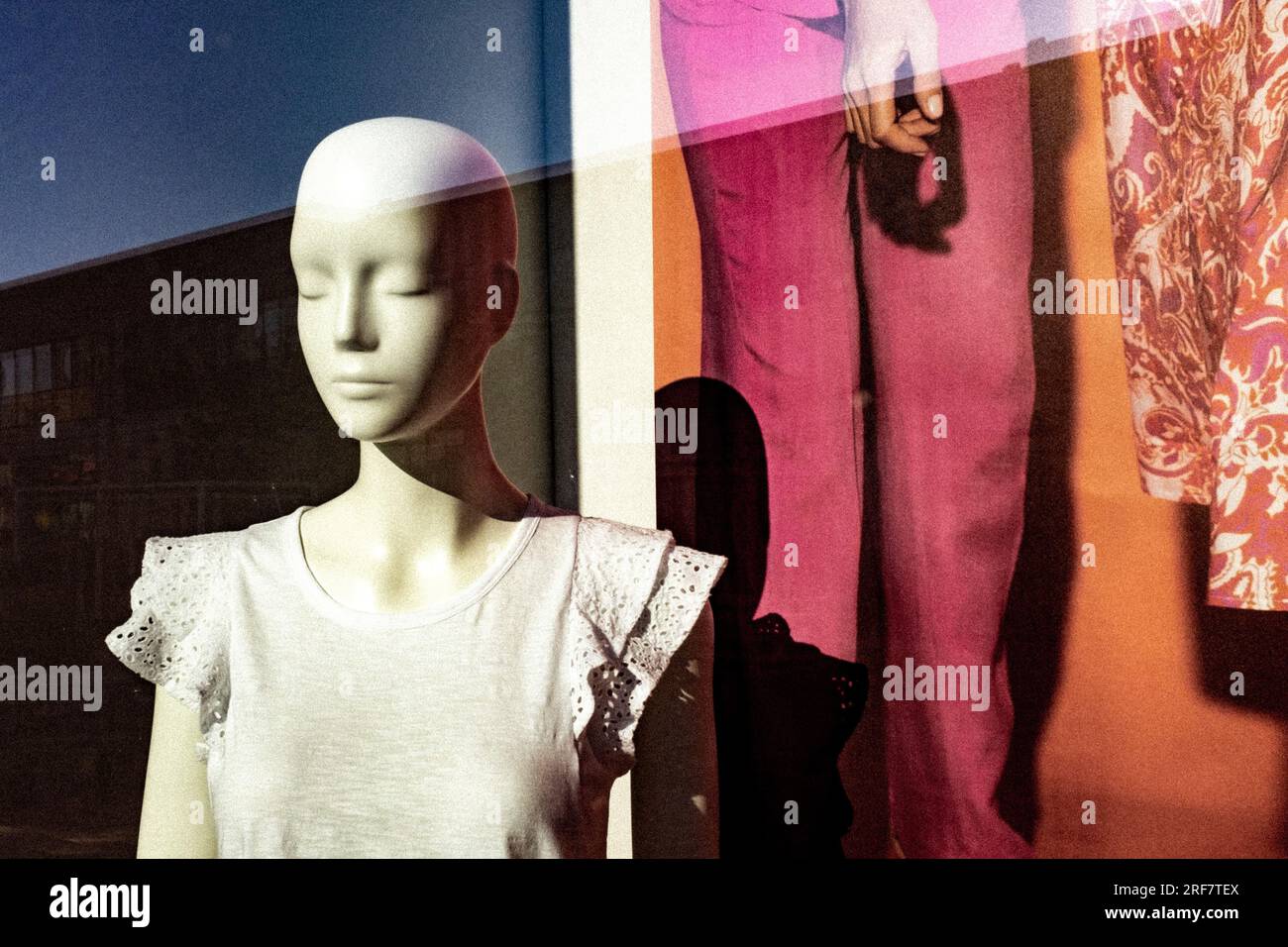 Female Mannequin in store front window Stock Photo Alamy