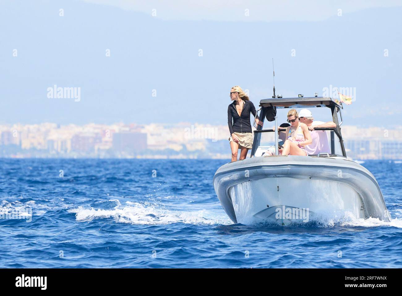 Palma. Spain. 20230801,  Carlos Moya, Carolina Cerezuela on board of a private boat during 41st Copa del Rey Mapfre Sailing Cup - Day 2 on August 1, 2023 in Palma, Spain Stock Photo