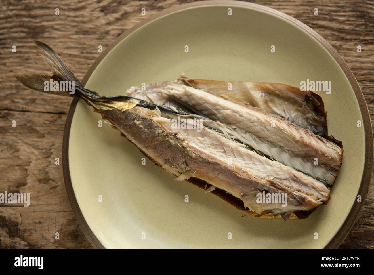 A hot smoked mackerel, Scomber scombrus, that is being prepared to make a homemade mackerel pate. England UK GB Stock Photo