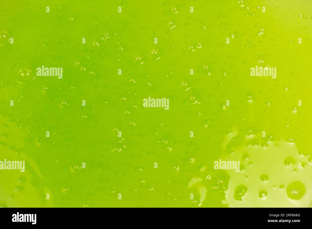 Green slime toy as a background. Top view Stock Photo - Alamy
