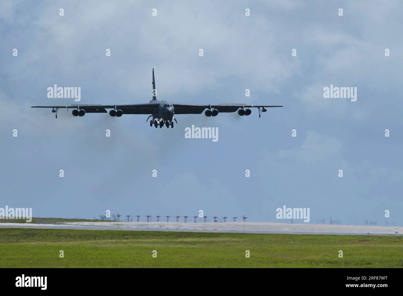 Yigo, United States. 13 July, 2023. A U.S. Air Force B-52H Stratofortress strategic bomber assigned to the 20th Expeditionary Bomb Squadron approaches to land at Andersen Air Force Base, July 14, 2023 in Yigo, Guam, USA.  Credit: A1C Nia Jacobs/U.S. Air Force Photo/Alamy Live News Stock Photo