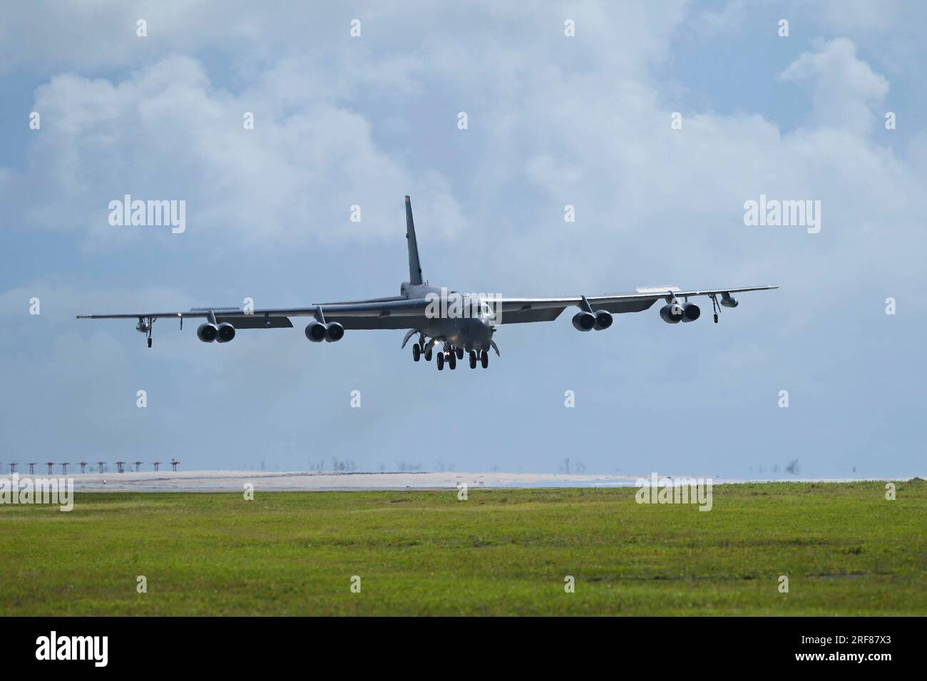 Yigo, United States. 14 July, 2023. A U.S. Air Force B-52H Stratofortress strategic bomber assigned to the 20th Expeditionary Bomb Squadron approaches to land at Andersen Air Force Base, July 14, 2023 in Yigo, Guam, USA.  Credit: A1C Nia Jacobs/U.S. Air Force Photo/Alamy Live News Stock Photo