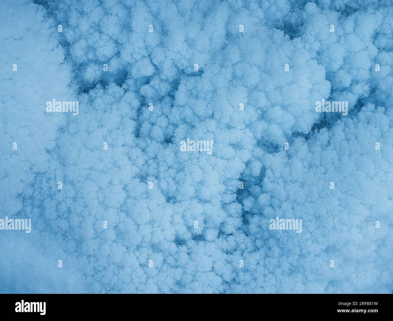 Frozen snow crystals texture or background Stock Photo