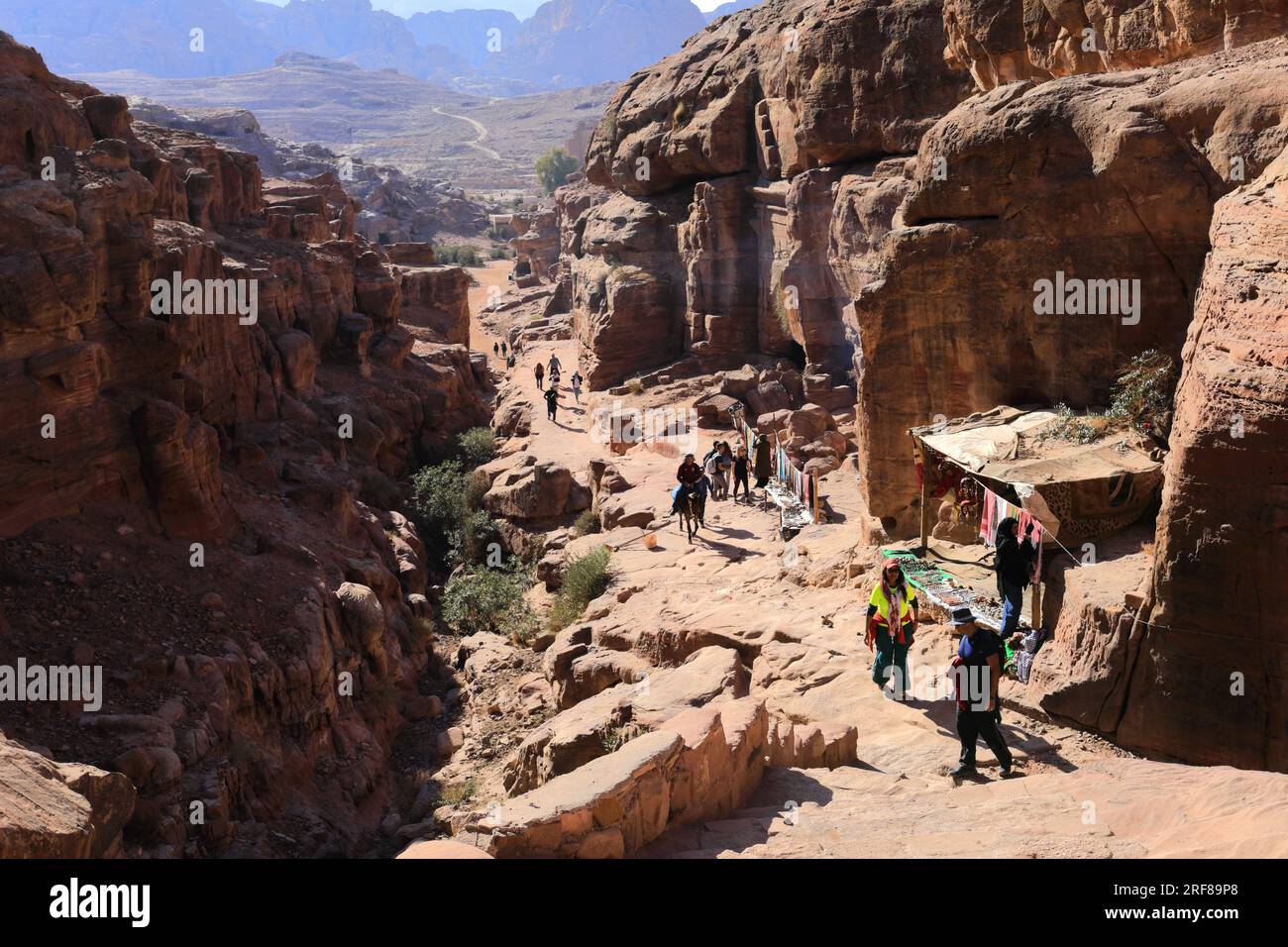 People on the Ad Deir Monastery trail down to Petra city, UNESCO World Heritage Site, Wadi Musa, Jordan, Middle East Stock Photo