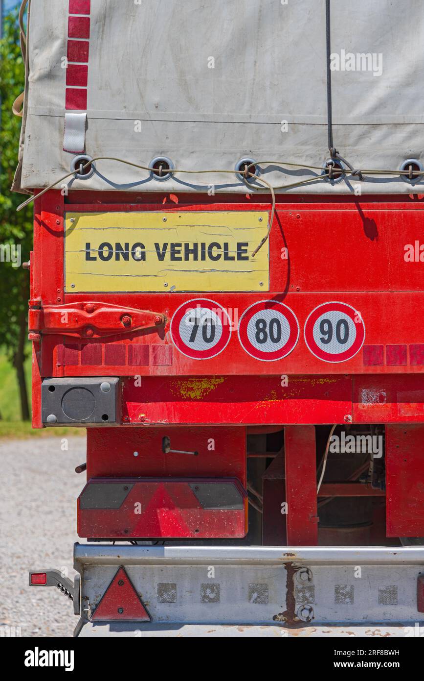 Long Vehicle Caution Speed Limit Stickers at Cargo Truck Trailer