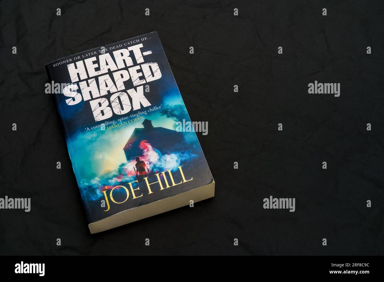 Heart Shaped Box by Joe Hill on dark surface. Lahti, Finland. June 18, 2023. Stock Photo