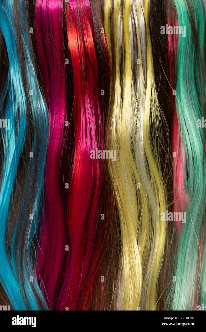 Blue yellow red color hair background. Long colored hair palette texture Stock Photo