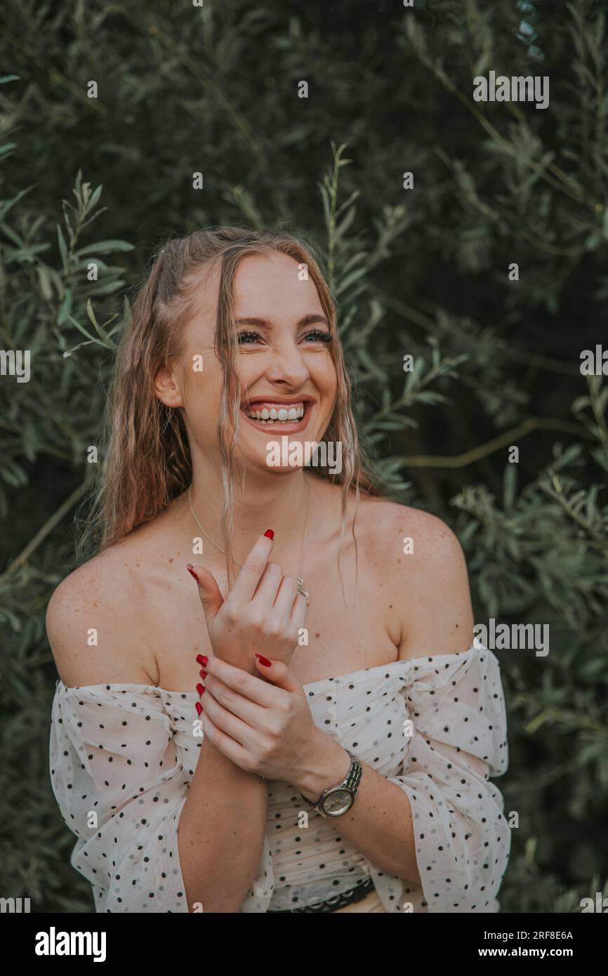 Woman clapping hands smiling wearing hi-res stock photography and ...