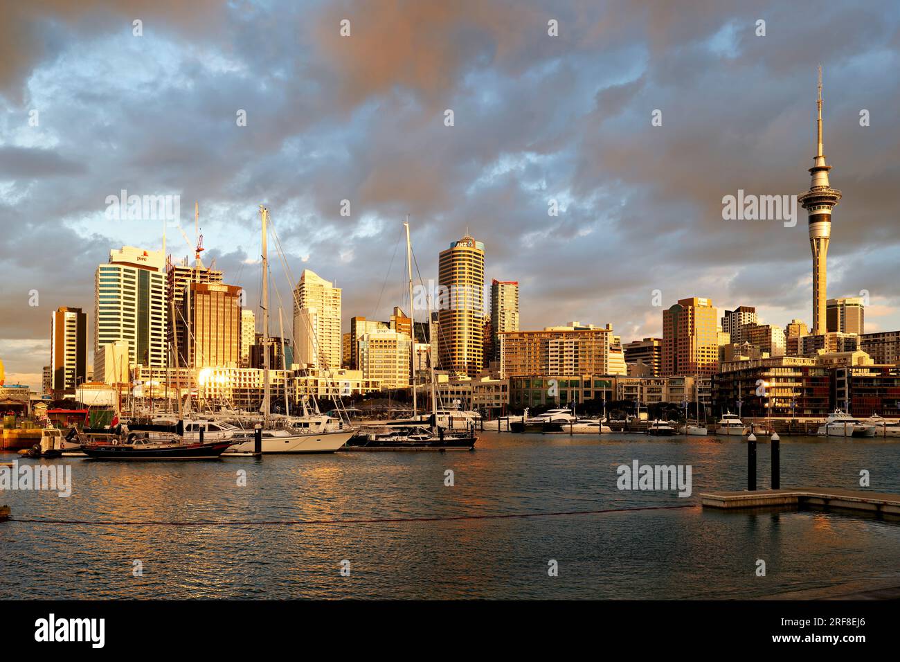Auckland. New Zealand. The city skyline. View from Viaduct Harbour at sunset Stock Photo