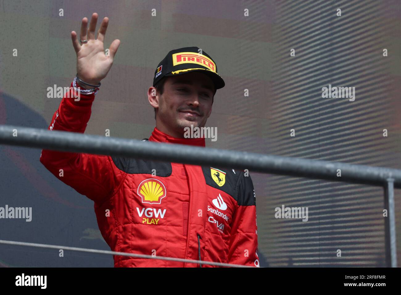 Charles Leclerc of Scuderia Ferrari celebrates on the podium at the end of the F1 Grand Prix of Belgium at Spa Francorchamps on July 30, 2023 Stavelot, Belgium. Stock Photo