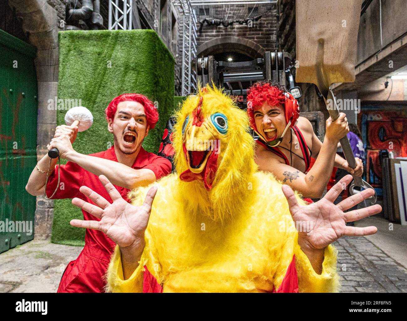 Edinburgh, United Kingdom. 01 August, 2023 Pictured L to R Performers from Batsu help in
