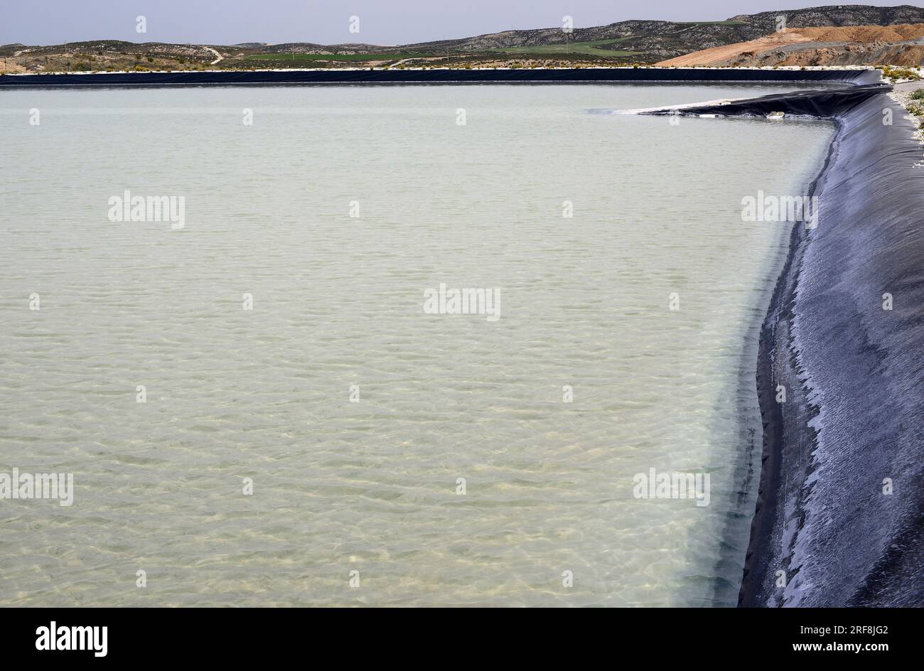 Salt evaporation ponds, salt works or salterns are artificial ponds ready to extract salts for water evaporation. Remolinos, Salinas de Remolinos, Zar Stock Photo