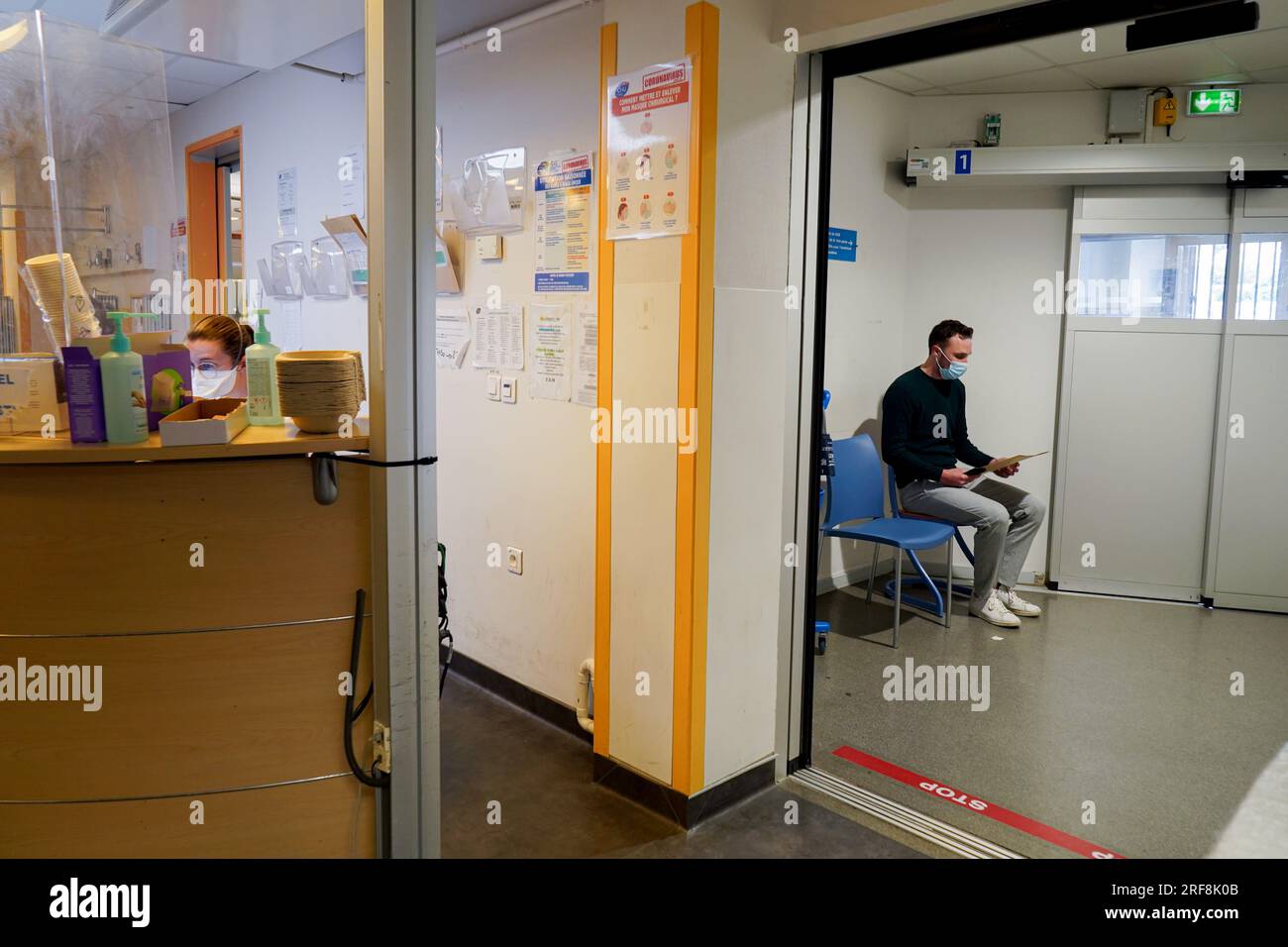 Patient in the emergency room of a university hospital. This young man ...