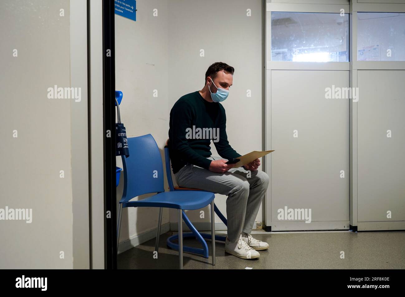 Patient in the emergency room of a university hospital. This young man ...