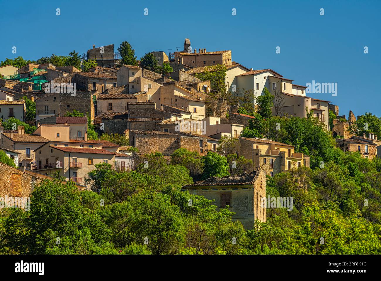 The small mountain village of San Benedetto in Perillis at the morning light Stock Photo