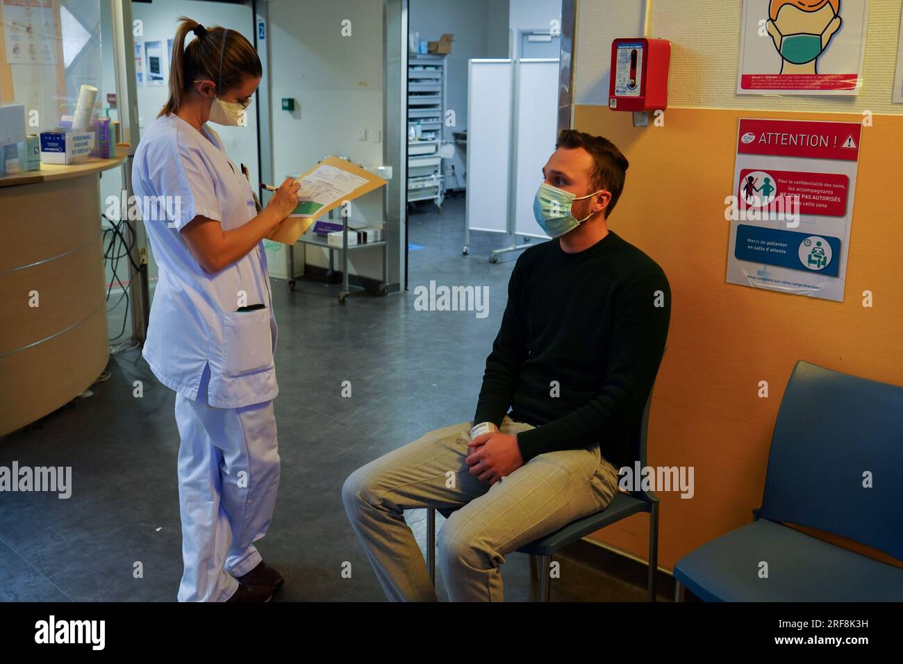 Patient in the emergency room of a university hospital. This young man ...