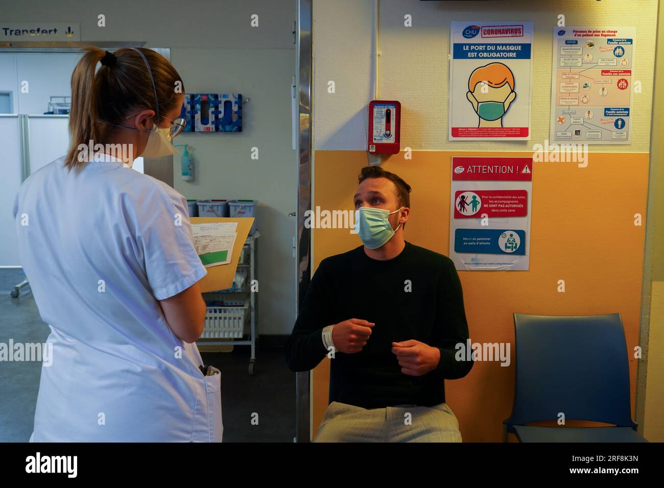 Patient in the emergency room of a university hospital. This young man ...