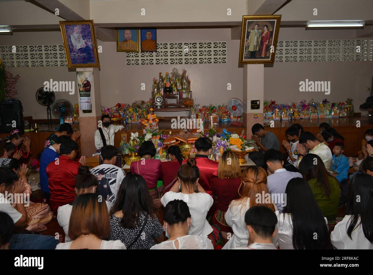 Bangkok, Thailand. 1st Aug, 2023. Buddhist people of Tai Yai, working in Bangkok and its vicinity, gather together to make merit according to the tradition on the occasion of ''Asalha Bucha Day'' at Wat Mai Sathu Pradit temple. Asalha Bucha Day is a Buddhist important day that commemorates Buddha's first sermon and the founding of the Buddha's four noble truths after his enlightenment. (Credit Image: © Teera Noisakran/Pacific Press via ZUMA Press Wire) EDITORIAL USAGE ONLY! Not for Commercial USAGE! Stock Photo