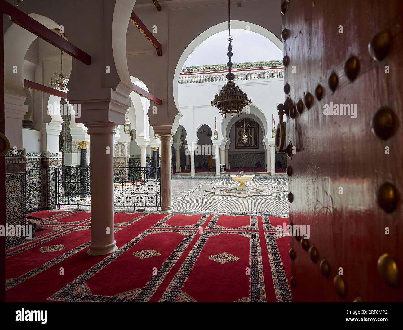 Fes, Morocco - 05 09 2016: artful ornamental decoration interior of the islamic Al Quaraouiyine Mosque and university in the medina of Fes in Morocco. Stock Photo