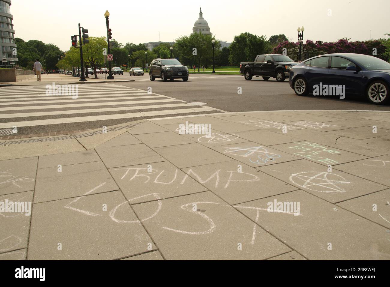 Washington, DC, USA. 1 Aug 2023. Anti-Trump messages are written in chalk outside the federal courthouse in anticipation of in impending indictment. Credit: Philip Yabut/Alamy Live News Stock Photo