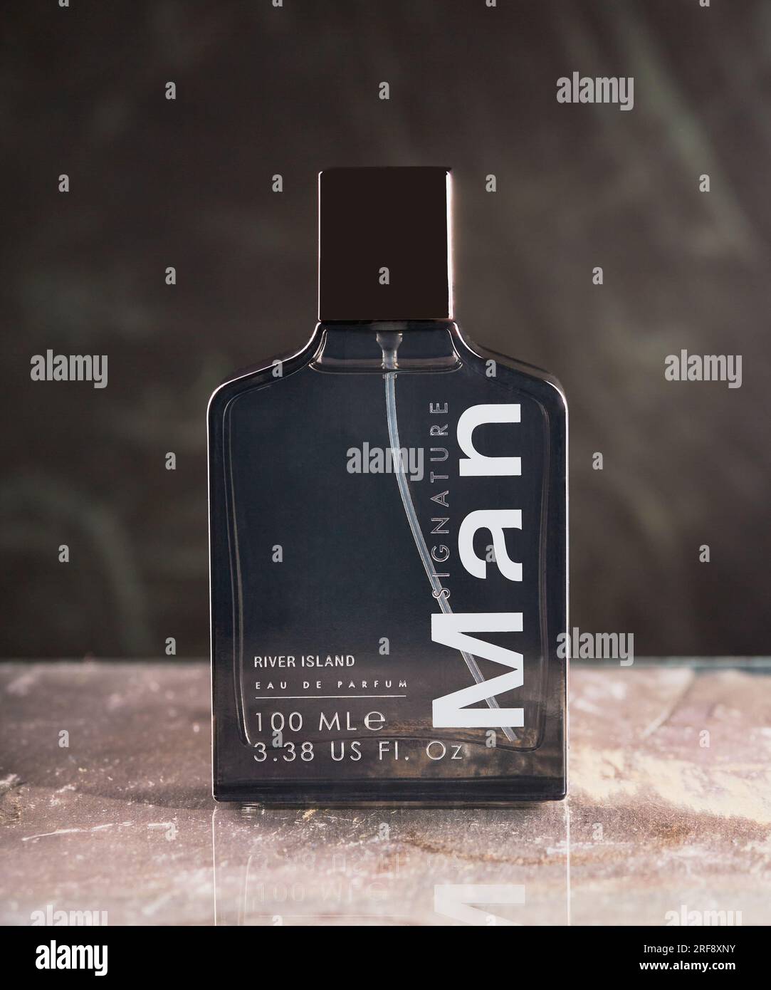 Mansfield,Nottingham,United Kingdom,1st August 2023:Studio product image of River Island Signature Man aftershave. Stock Photo