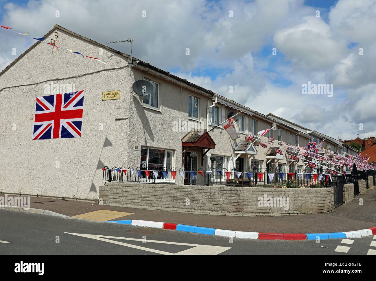 Houses at the Lower Shankill in Belfast decorated for Orange Day Stock Photo