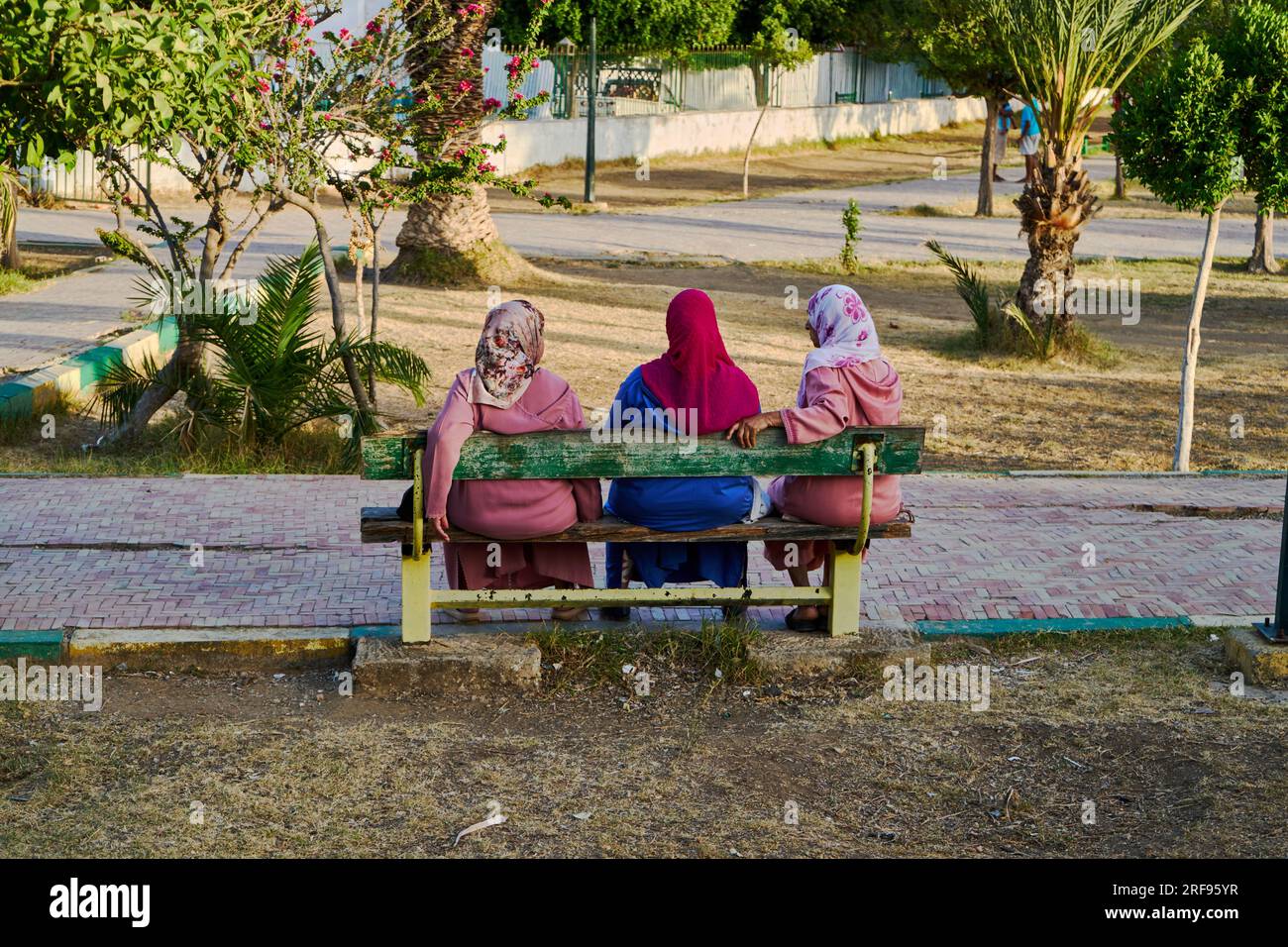 Moroccan women sitting on the bench in the park Stock Photo