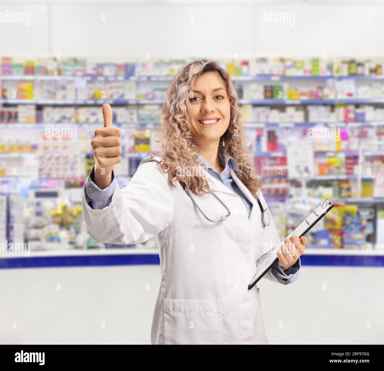 Thumbs up young female doctor hi-res stock photography and images - Alamy