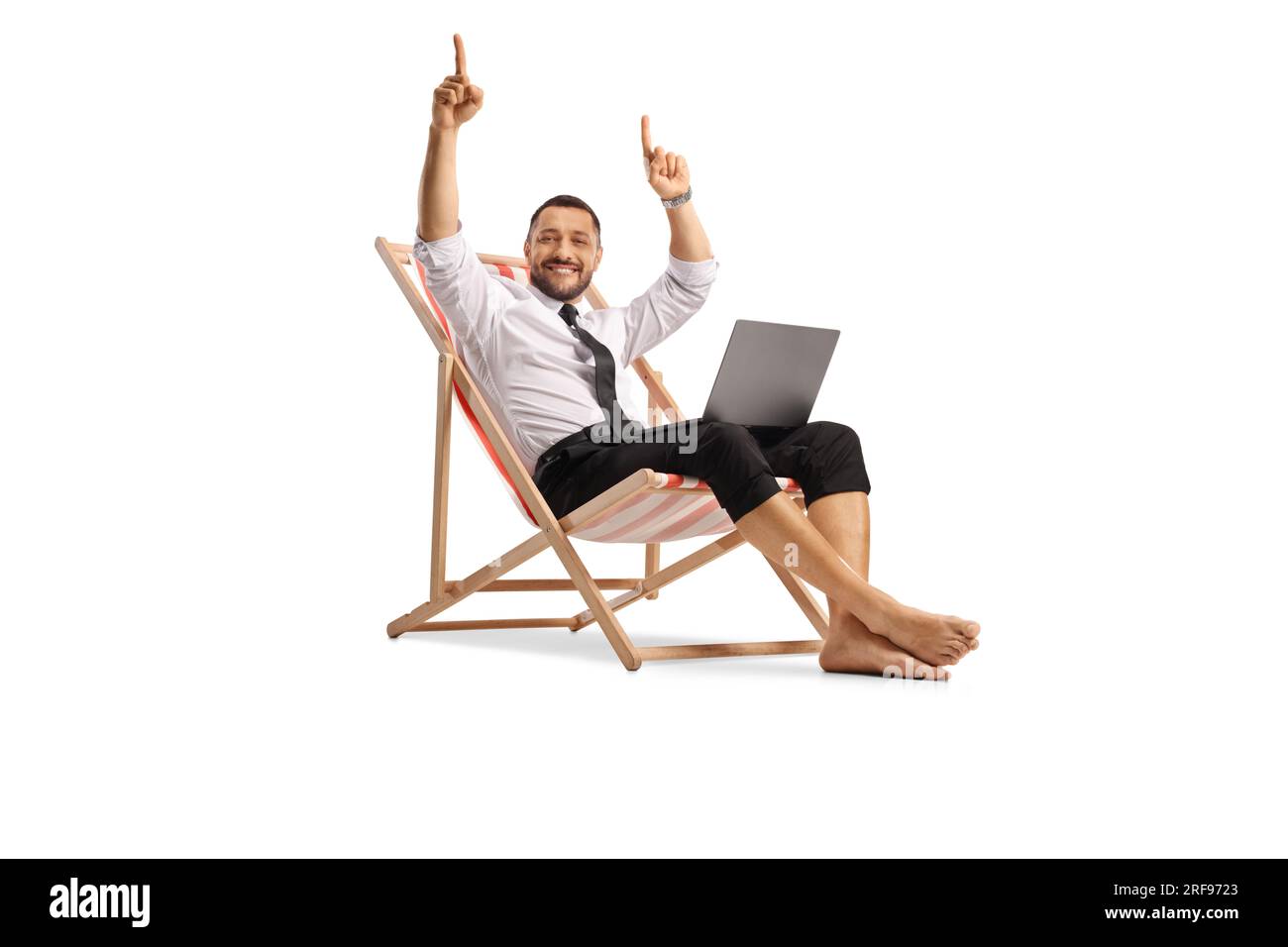Businessman smiling and enjoying on a beach chair with a laptop computer isolated on white background Stock Photo