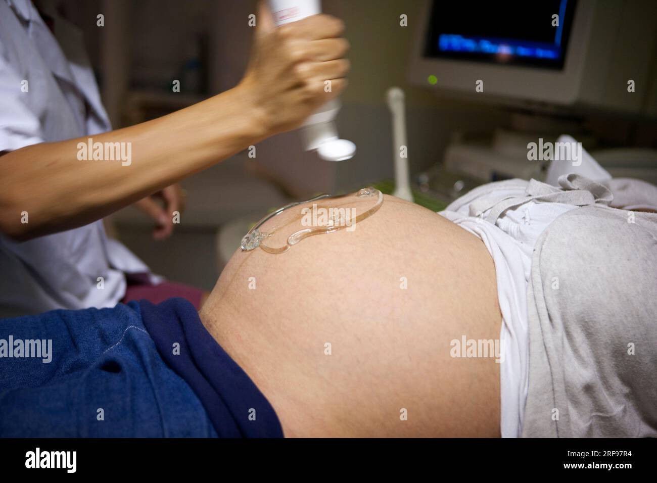 Ultrasound scan of a pregnant woman at 8 months pregnant in the maternity ward of the hospital. Stock Photo