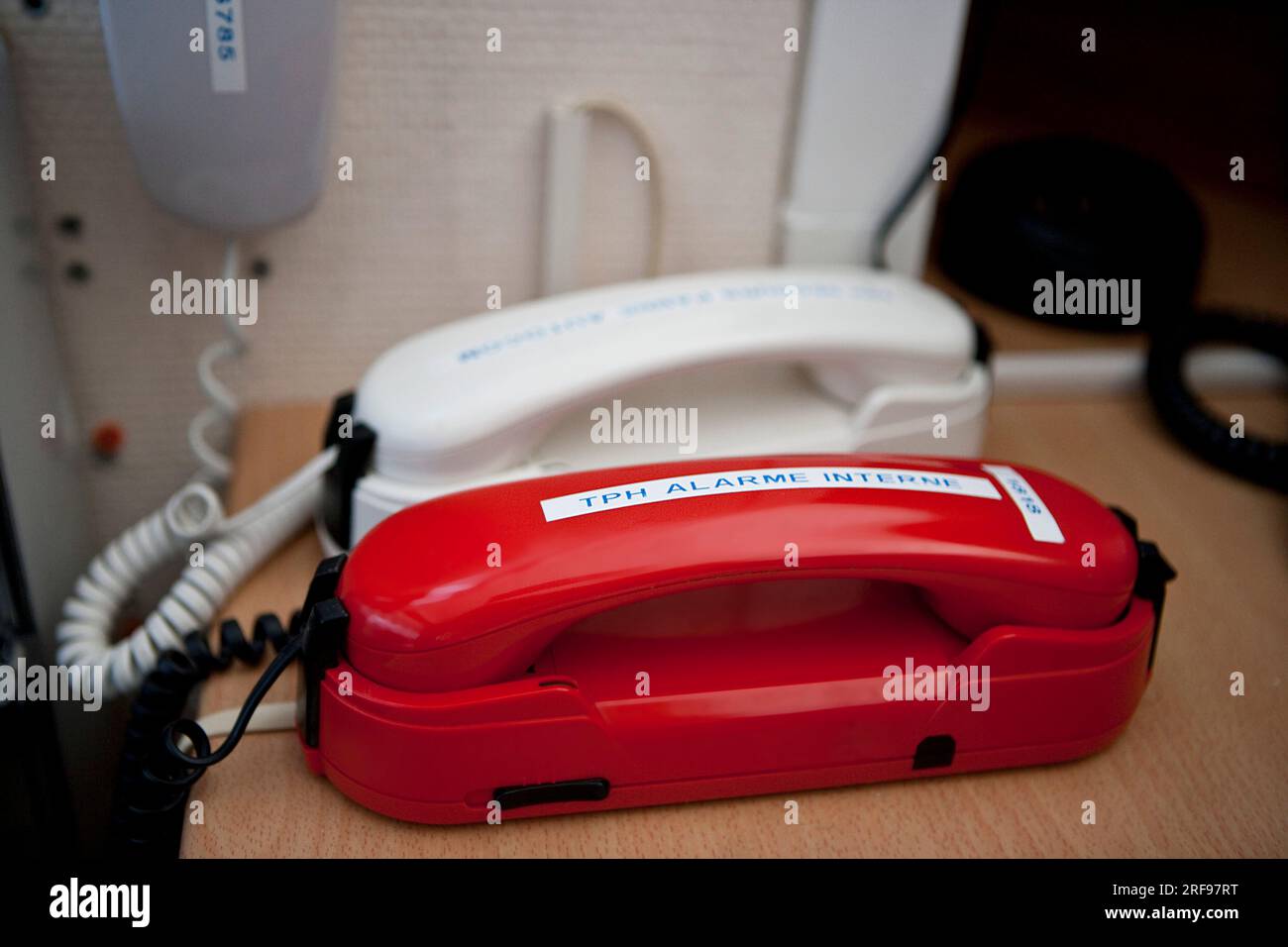 Telephone triggering an alarm in the maternity ward of a hospital. Stock Photo