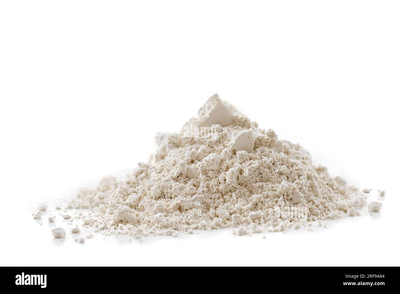 Pile of superfine white clay on white background. Stock Photo