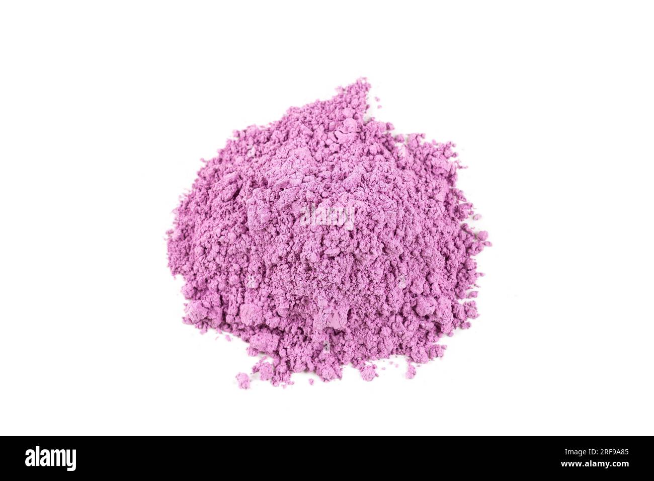 Heap of superfine purple clay on white background. Stock Photo