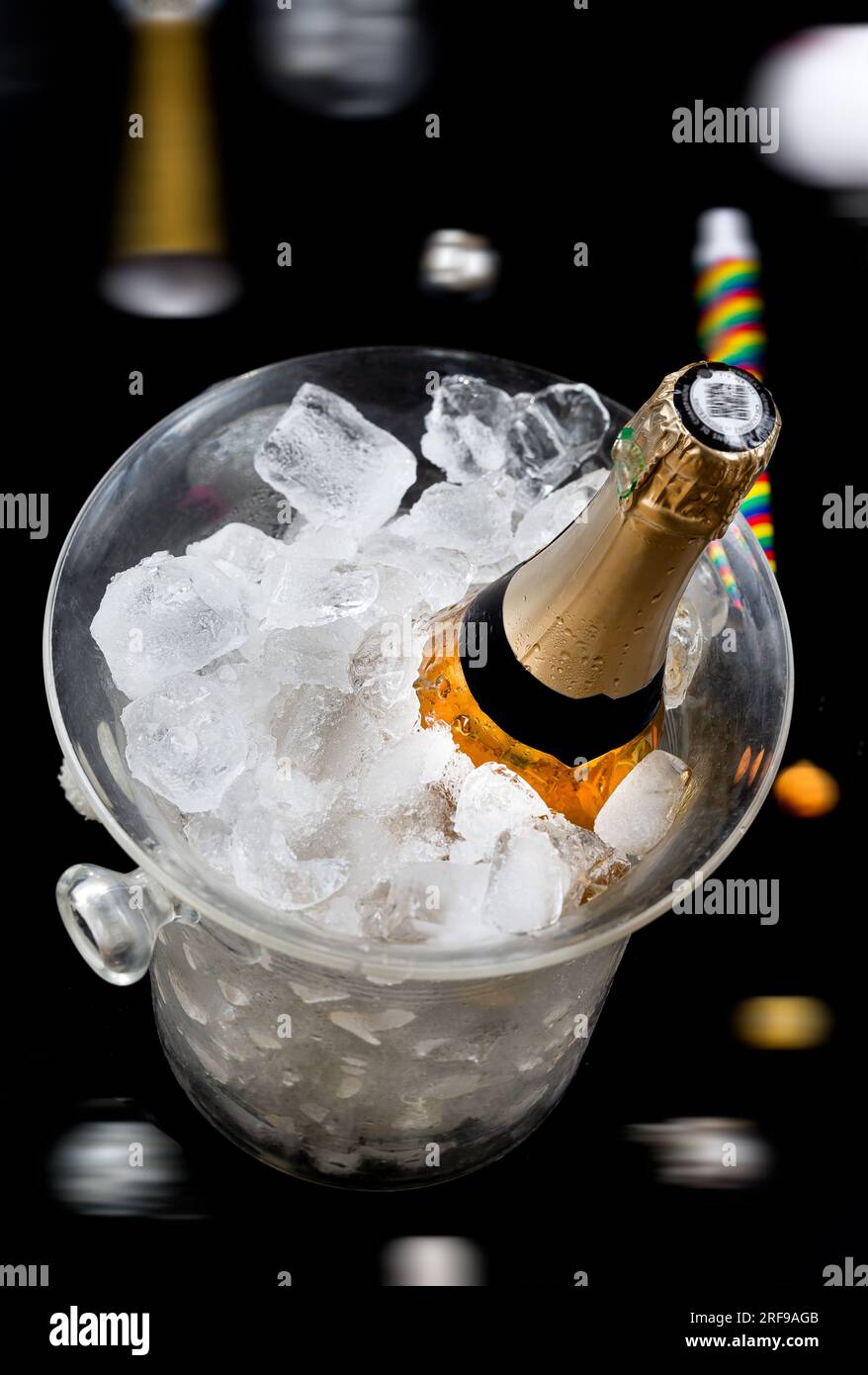 Bottle of champagne in an ice bucket Stock Photo Alamy