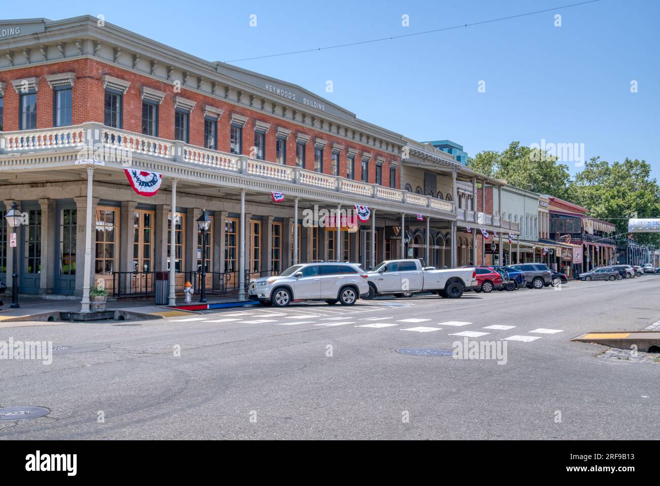 Sacramento, CA - May 25, 2023: Historic buildings line the street in Old Town Sacremento located near the waterfront of the city of Sacremento, Califo Stock Photo