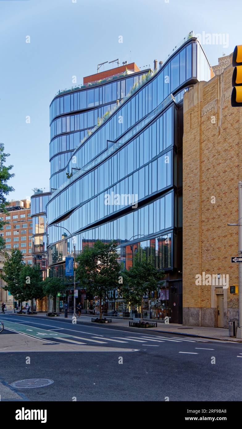 West Village: Built new in a landmark district, One Jackson Square’s owners said that the quirky glass building reflected the district and its values. Stock Photo