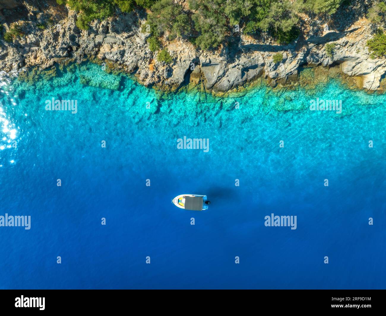 Aerial view of alone small motorboat on the sea in summer Stock Photo ...