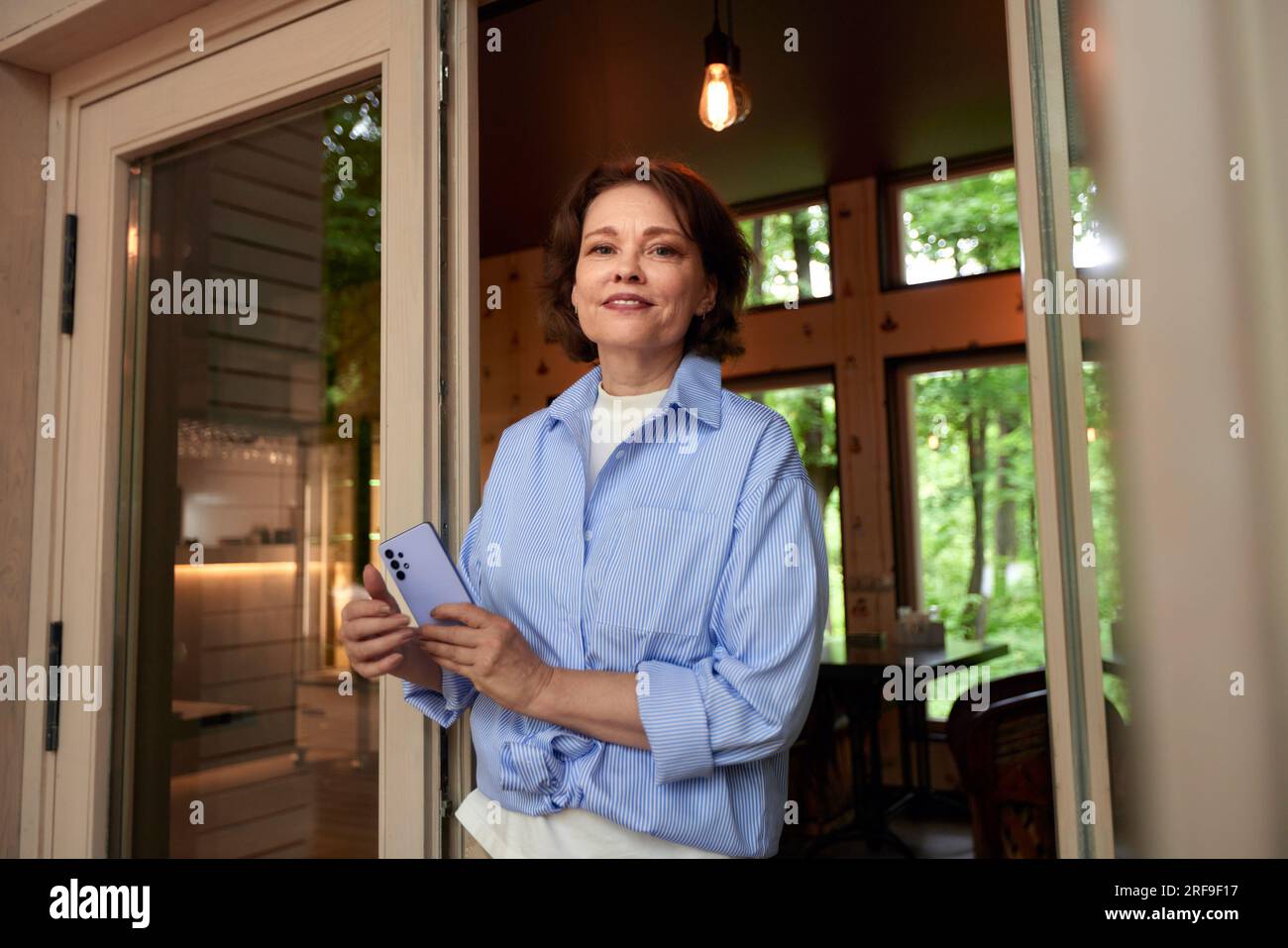 Old lady sitting on porch hi-res stock photography and images - Alamy