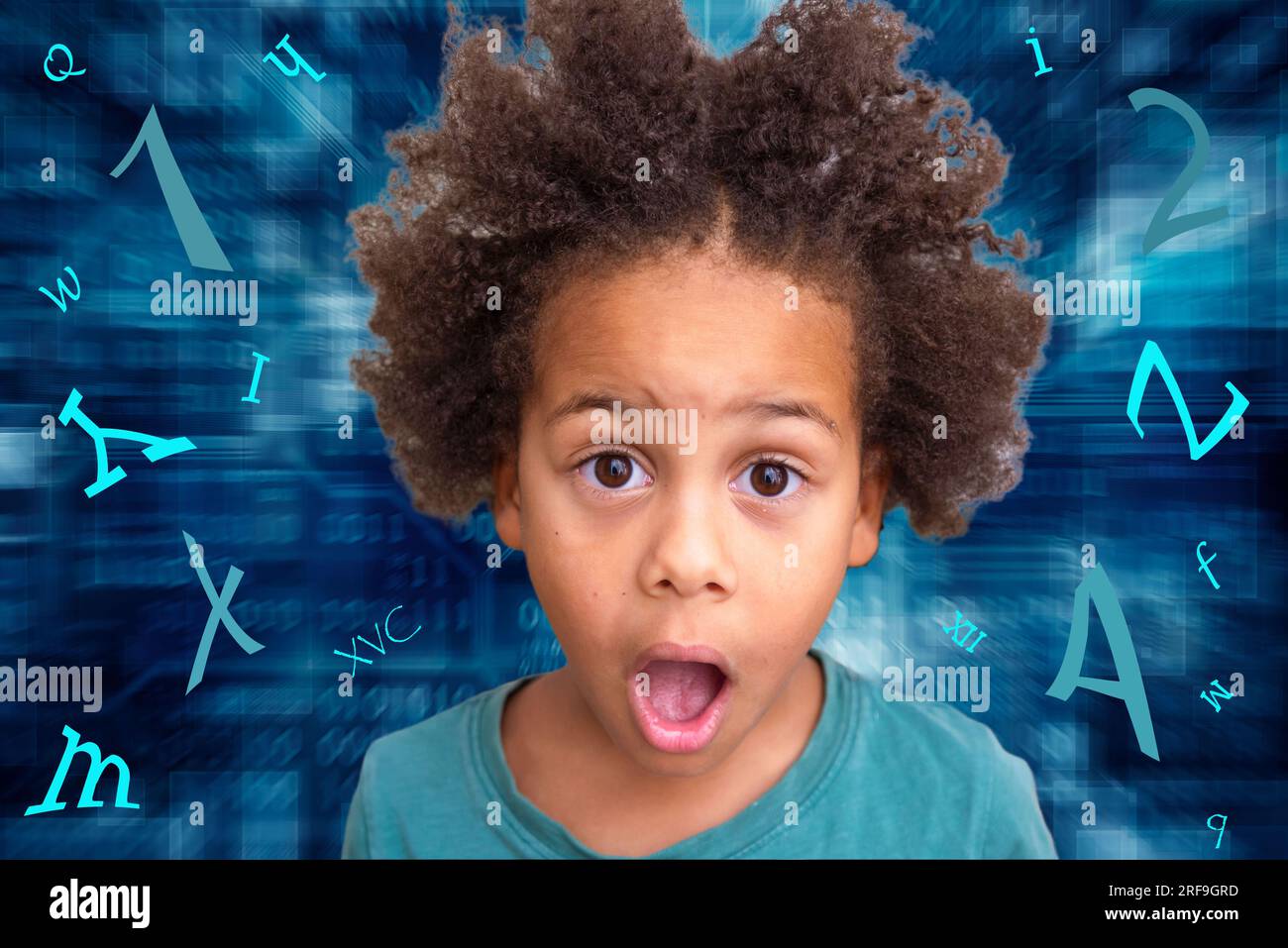Surprised Shocked preschool boy in front of the blue technology