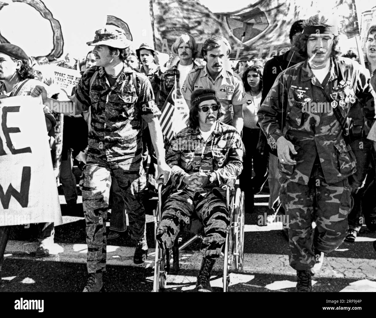 San Francisco, California: 1970 An anti Vietnam War peace march with Vietnam vets, one an amputee in a wheelchair, leading the way. Stock Photo
