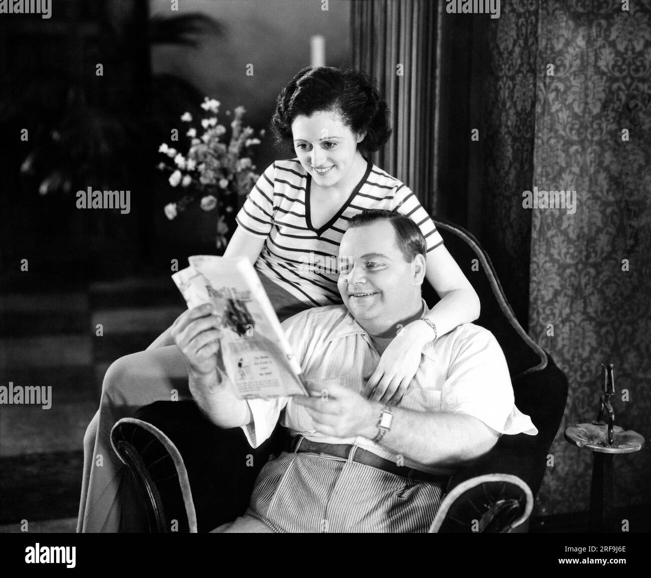 United States:  1931 Roscoe 'Fatty' Arbuckle with his bride to be, Addie McPhail. Stock Photo