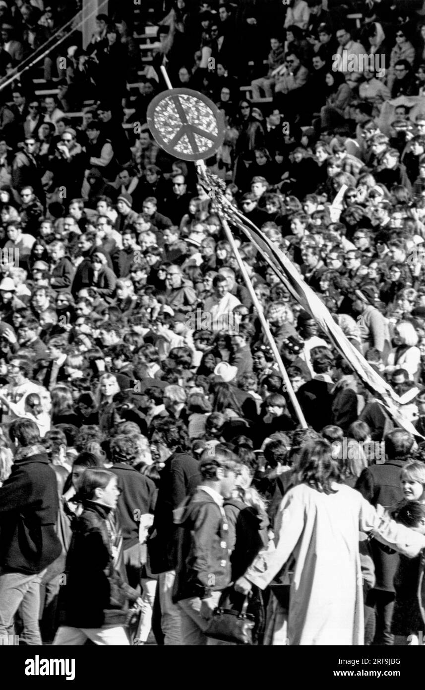 San Francisco, California:  c. 1969 People at an early anti Vietnam War gathering at Kezar Stadium. Stock Photo