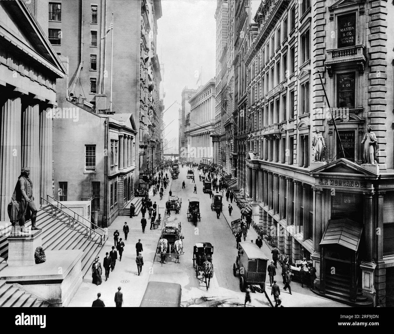 New York, New York 1911 Looking east on Wall St. from Nassau St Stock