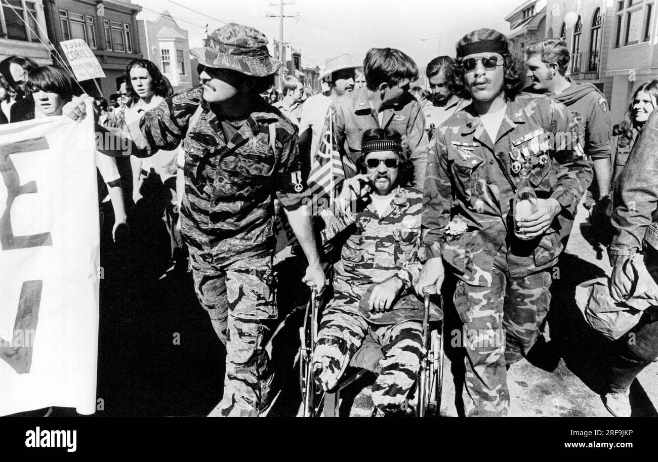 San Francisco, California: 1970 An anti Vietnam War peace march with Vietnam vets, one an amputee in a wheelchair, leading the way. Stock Photo